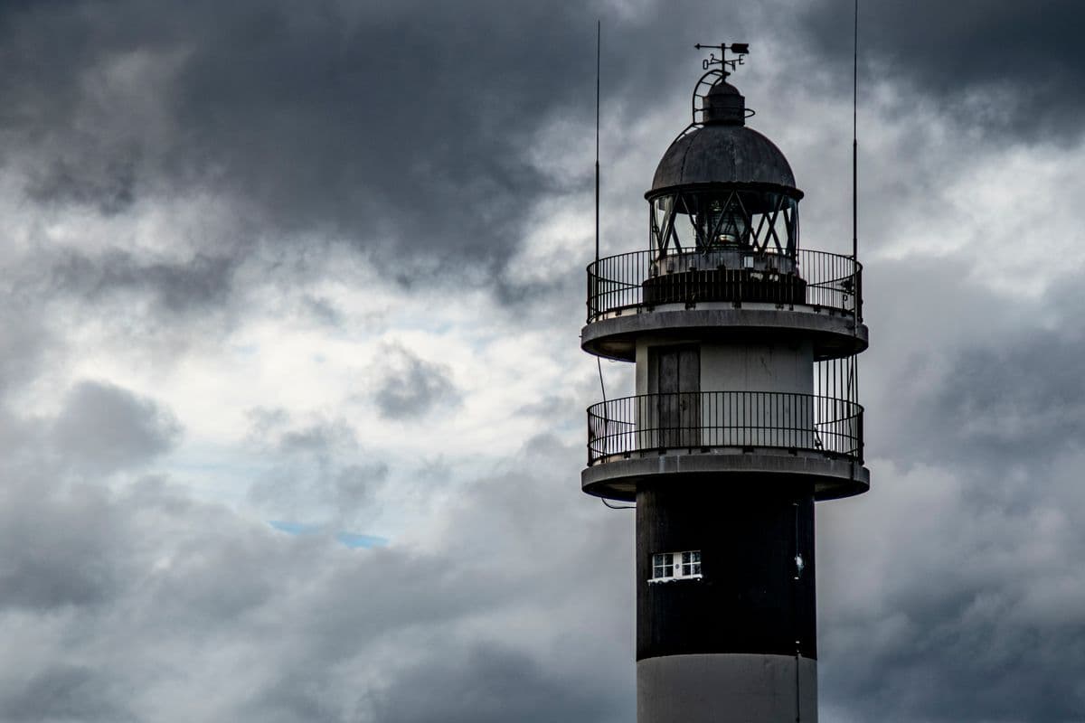 Lighthouse against dramatic clouds